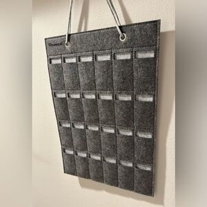 Gray felt hanging watchband holder/eyeglass holder